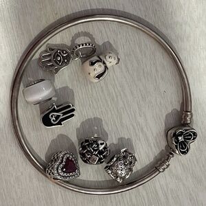 Pandora heart clasp bangle with 7 pandora charms